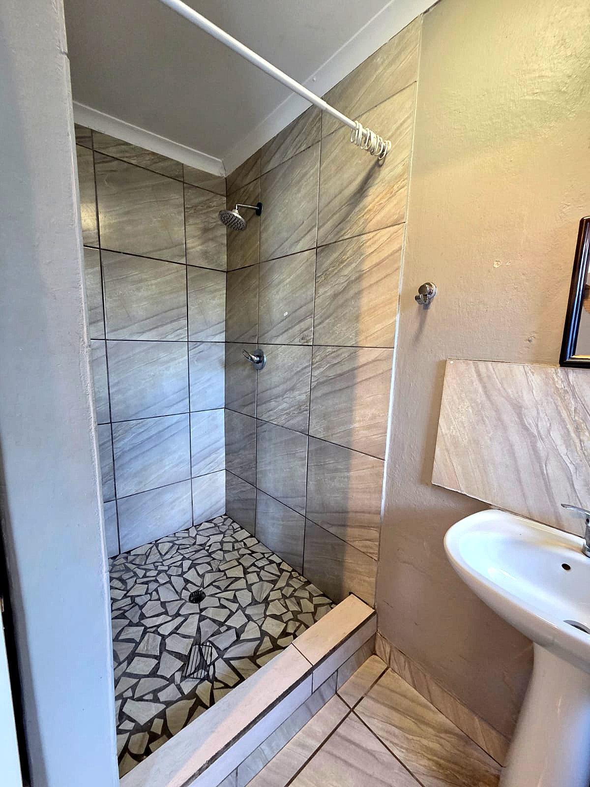 Tiled shower at Glyn Lane House
